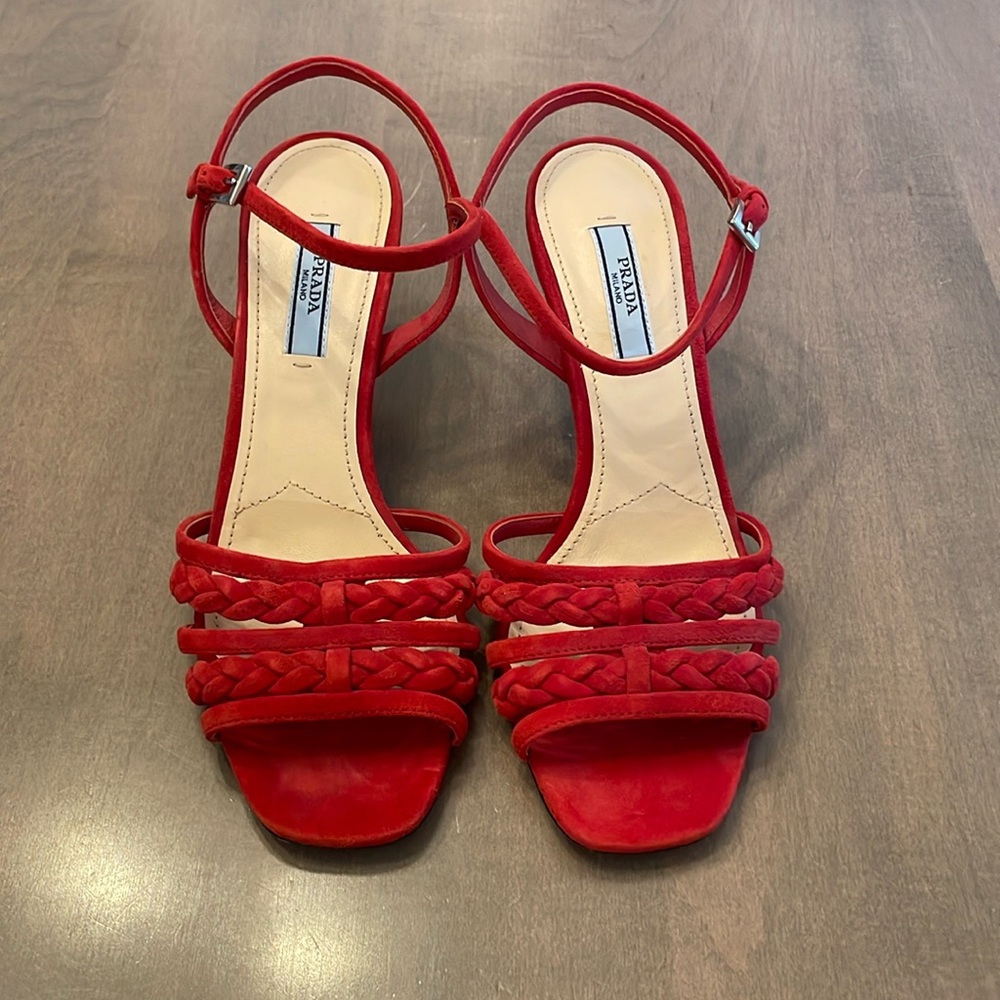Like new red suede Prada kitten heels, approximately 1 inch.